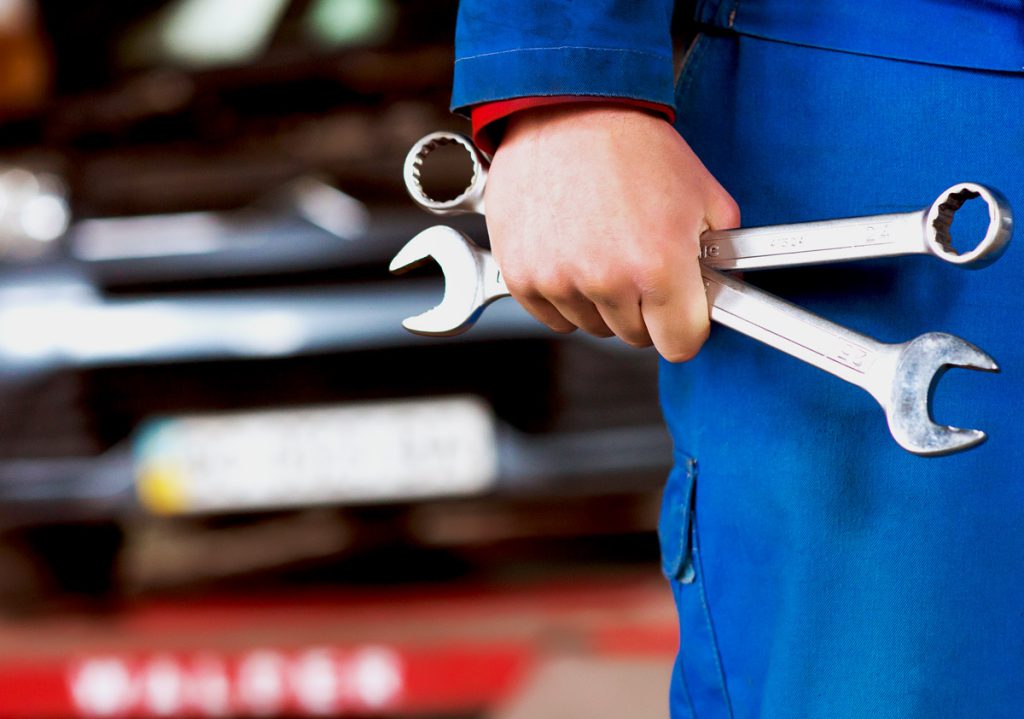 Mechanic holding tools - Car Repairs Glasgow